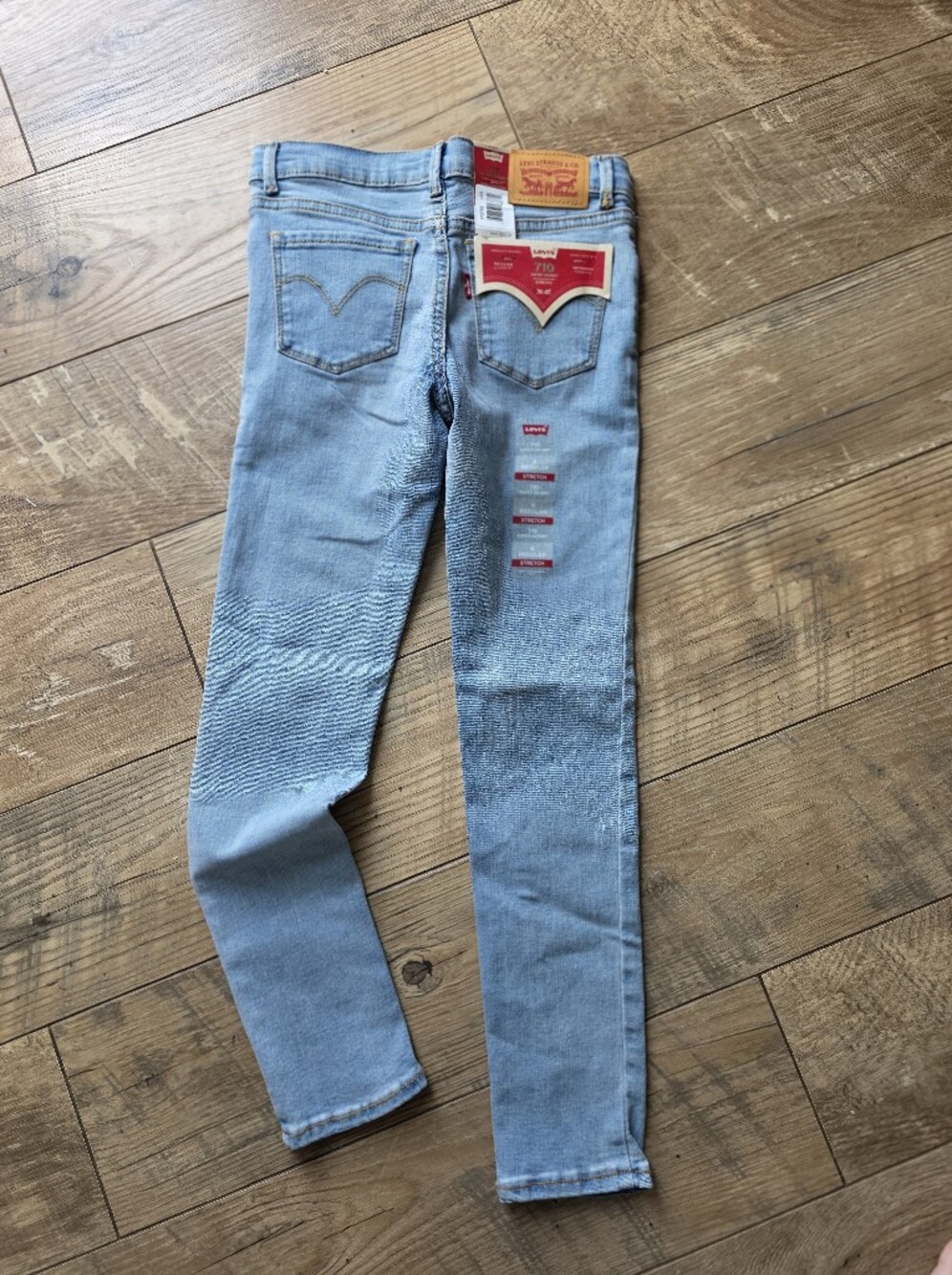 Light Wash Levi's Skinny Jeans with Red Tab Details